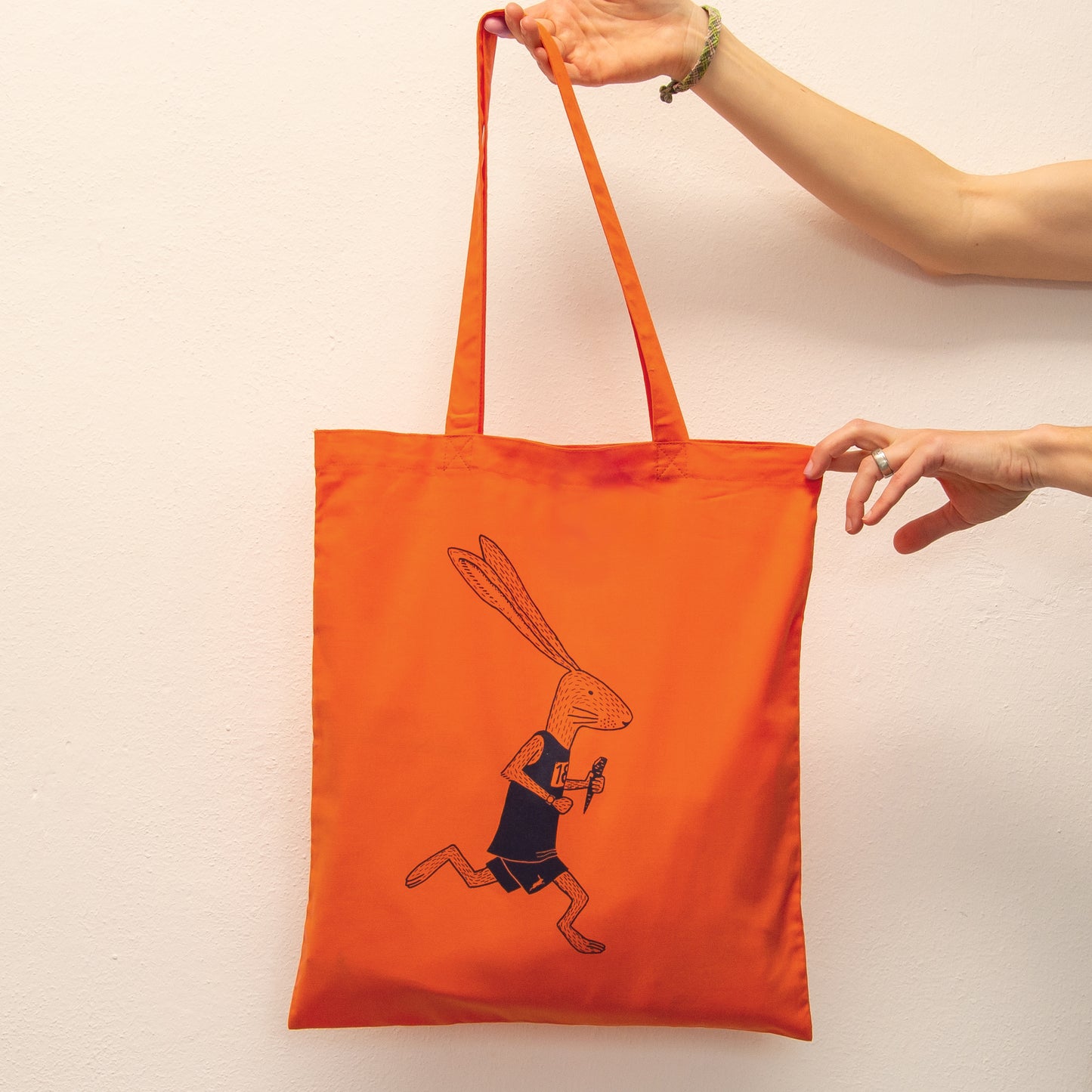 Laufhase Tasche in bright orange