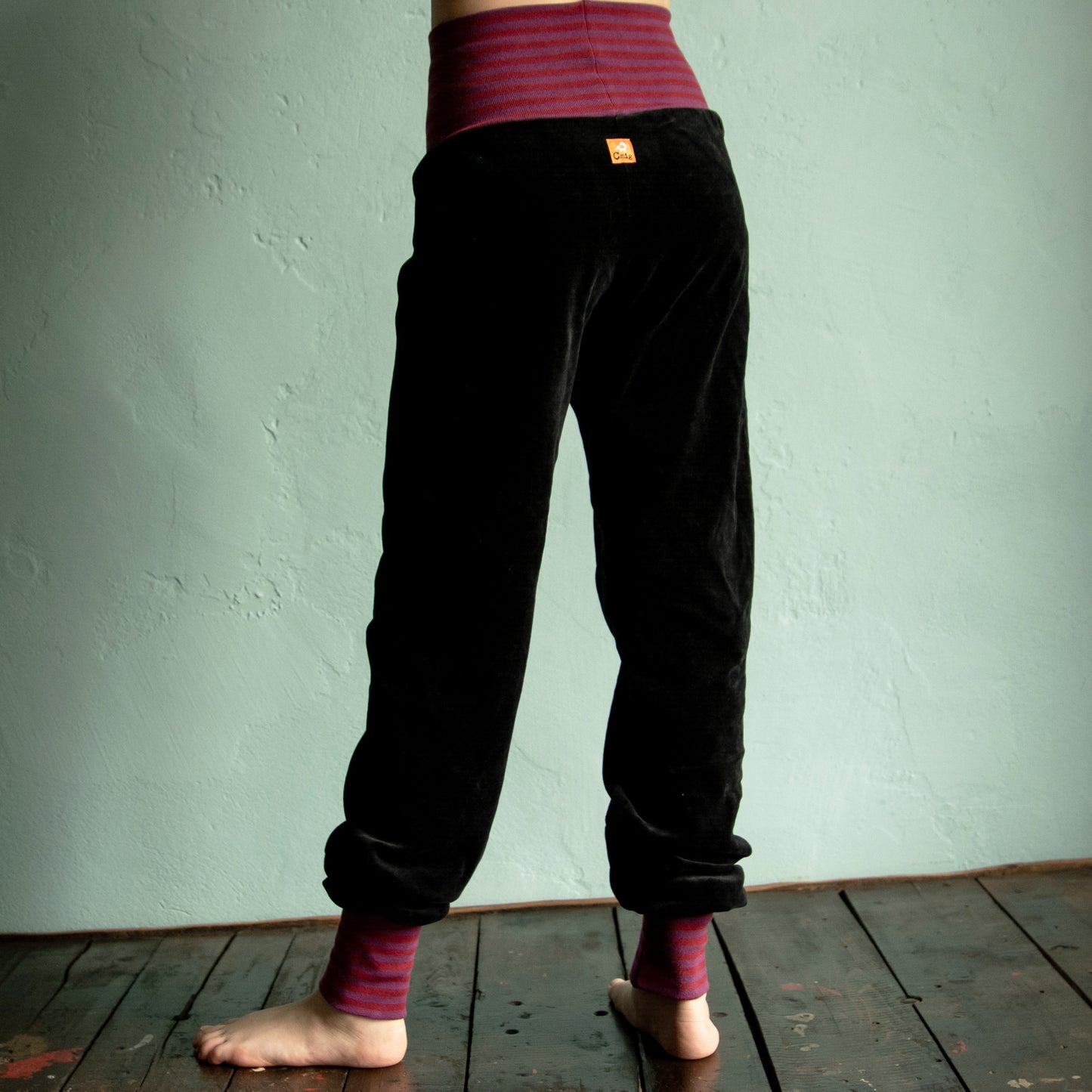 Kinder Nickihose in schwarz / rot-lila 98-110