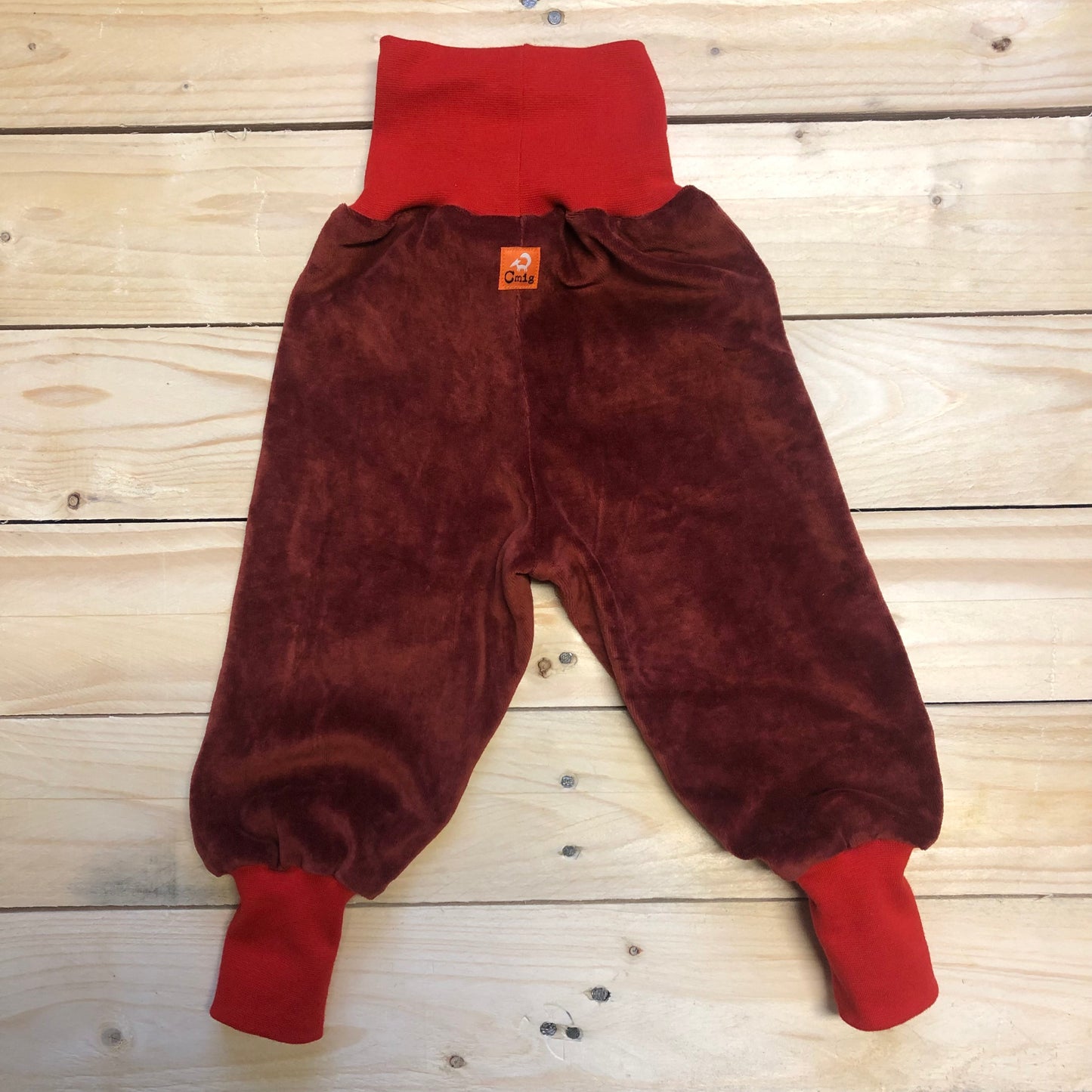 Baby Nickihose in rost / rot 56-86