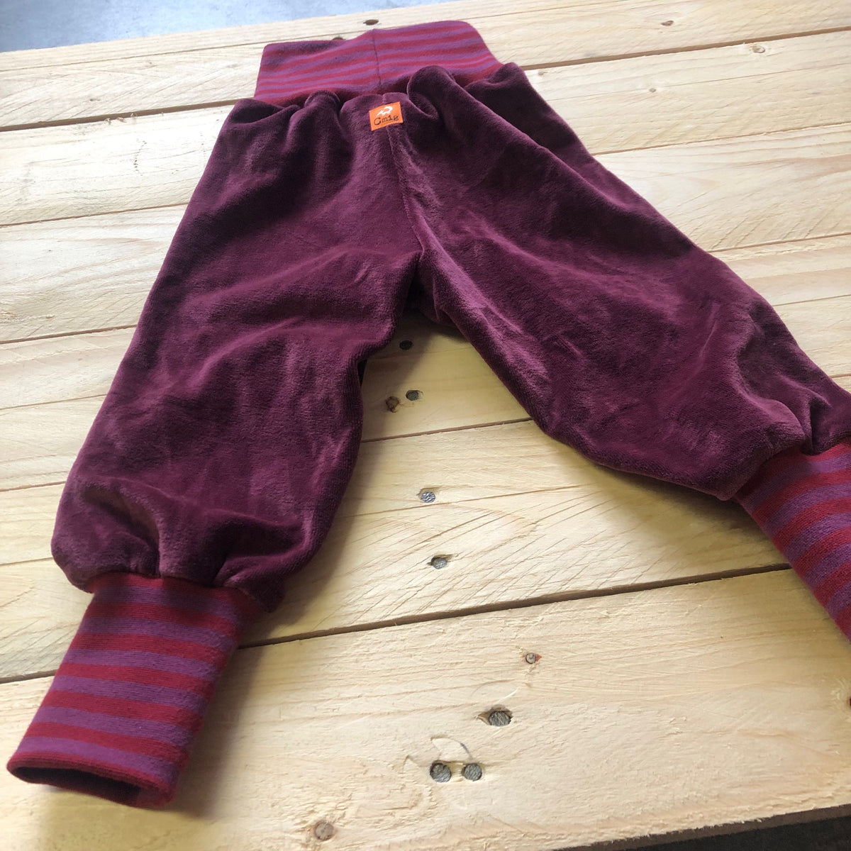 Baby Nickihose in berry / lila-rot 68/74