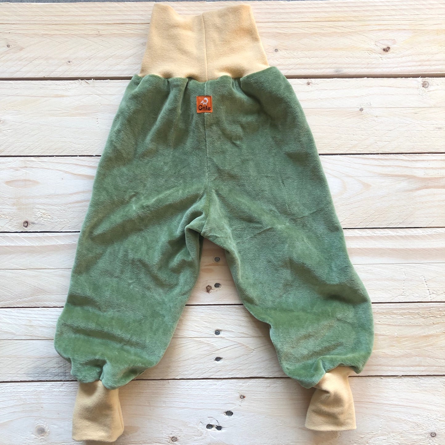 Kinder Nickihose in moss green / light yellow 128