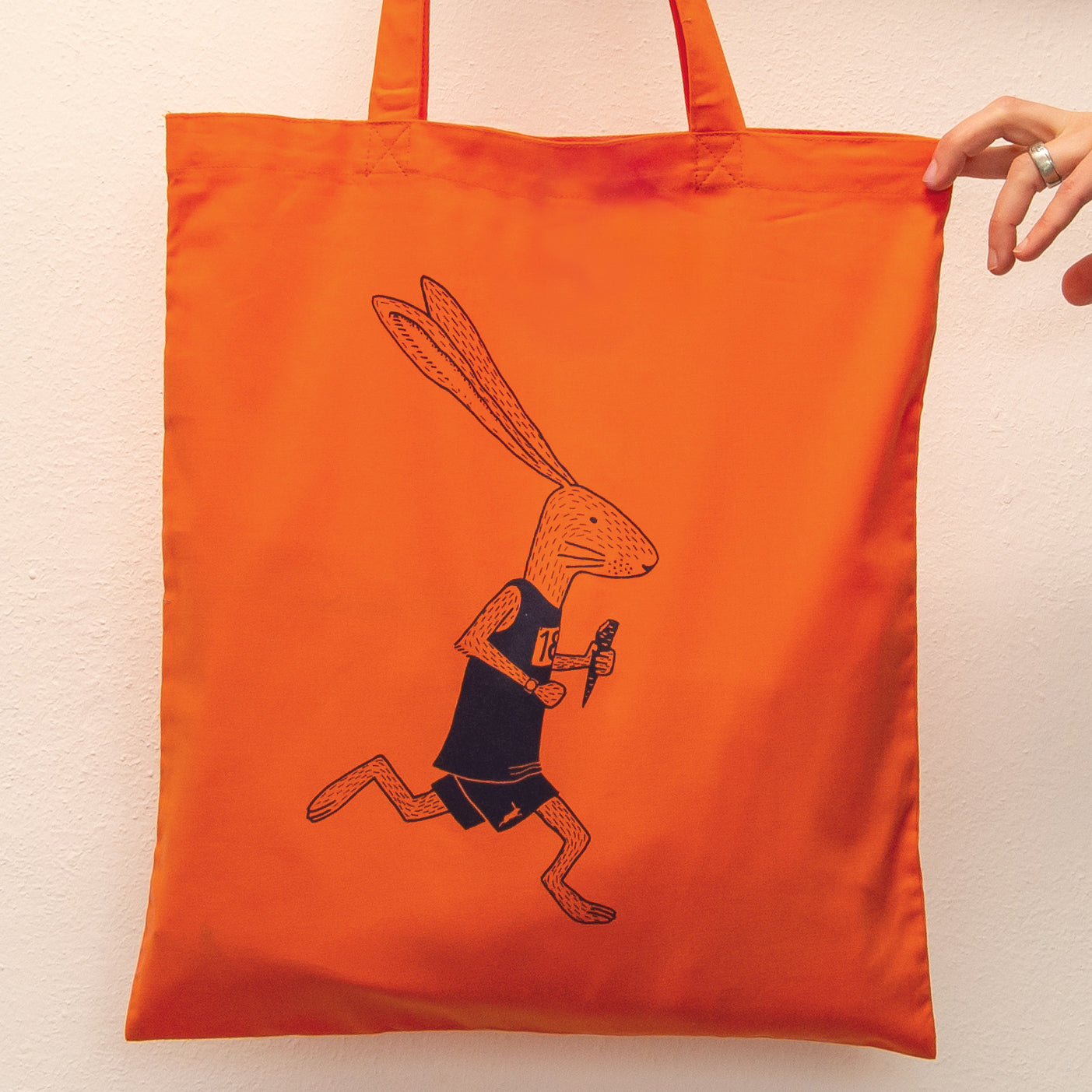Laufhase Tasche in bright orange